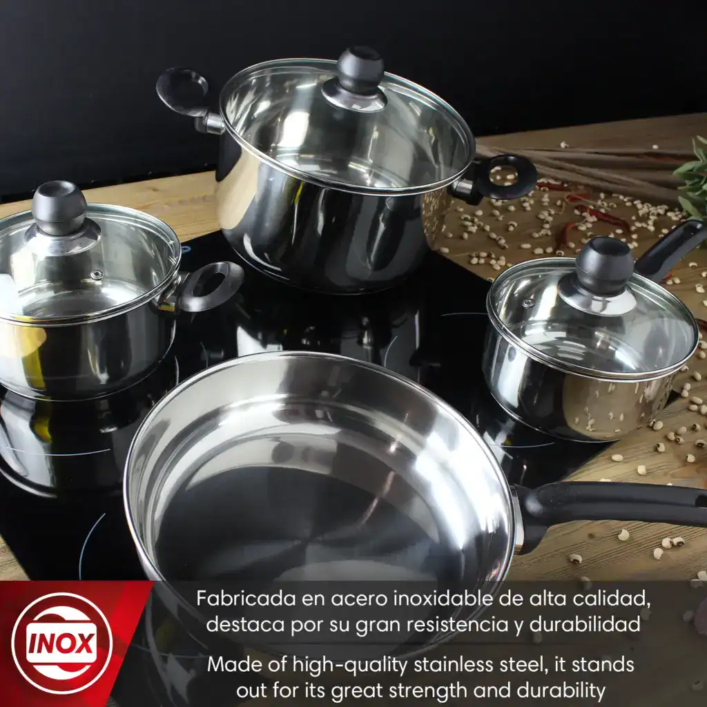 Top view of Magefesa stainless steel cookware set with ergonomic handles and glass lids