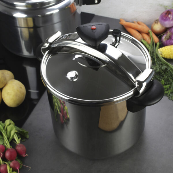 Magefesa Star fast pressure cooker in the table with carrots, potatoes and corn