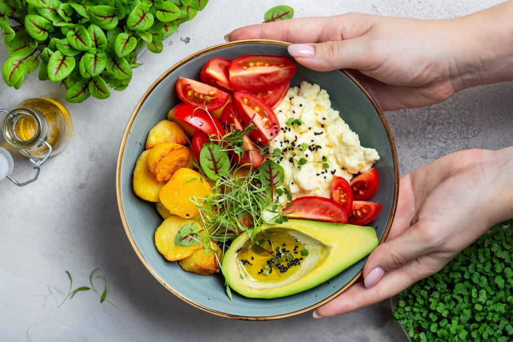 scrambled eggs with cherry tomatoes avocado fried potatoes magefesa
